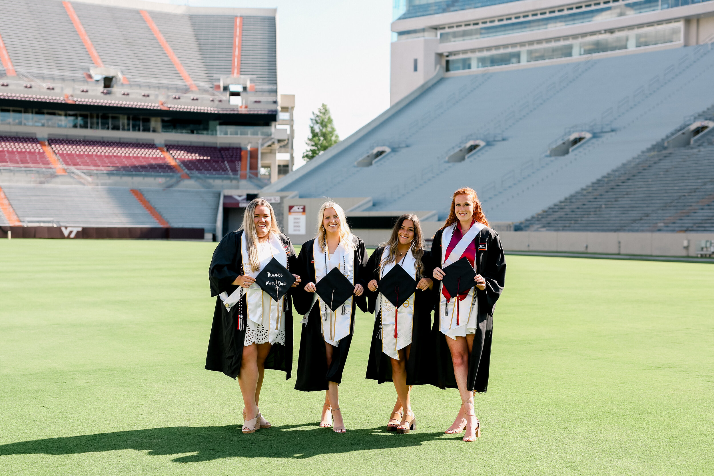 Lane Stadium campus graduation pictures for a group of sorority sisters