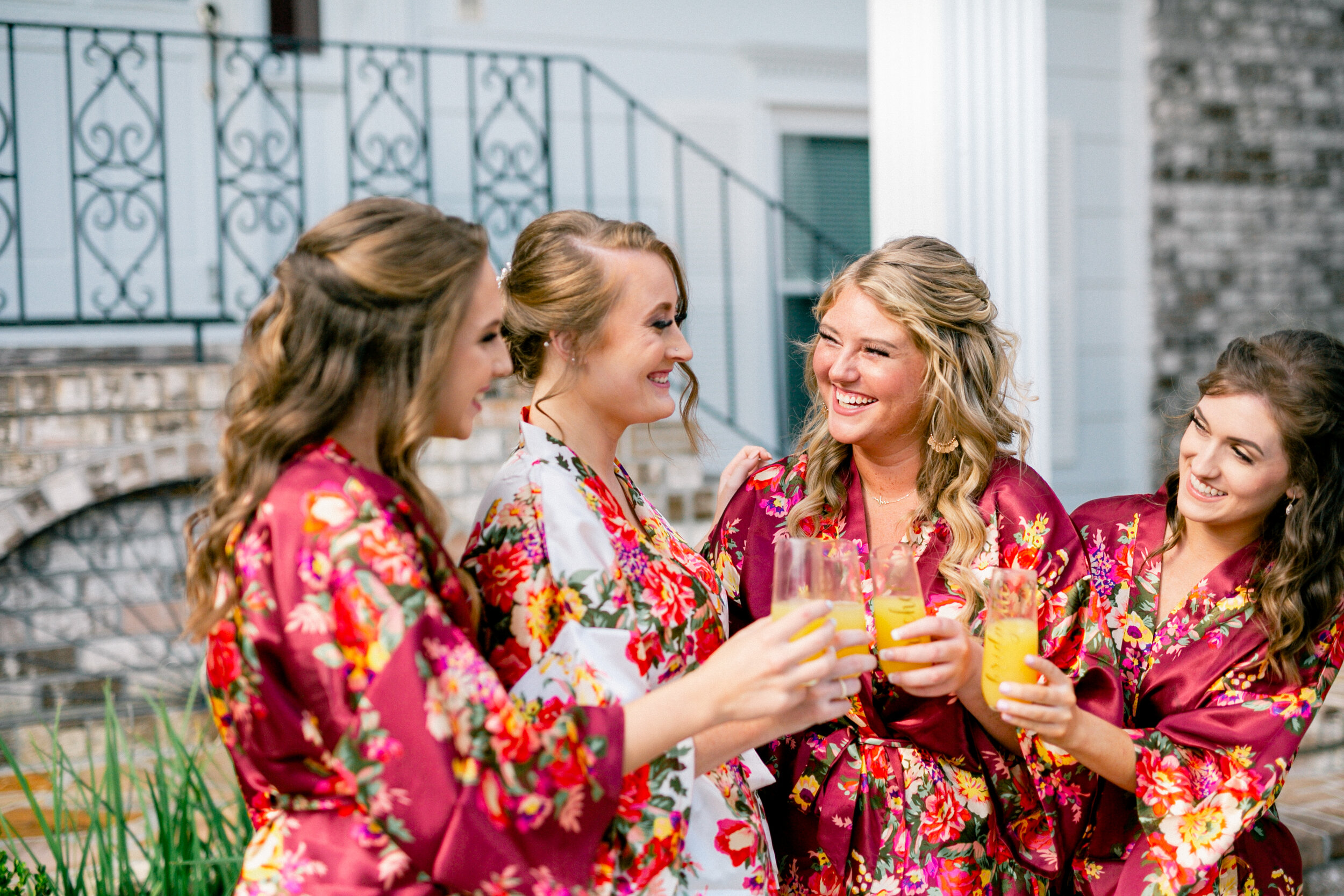 Stunning bride and bridesmaids getting ready for an oceanfront wedding in Charleston, South Carolina