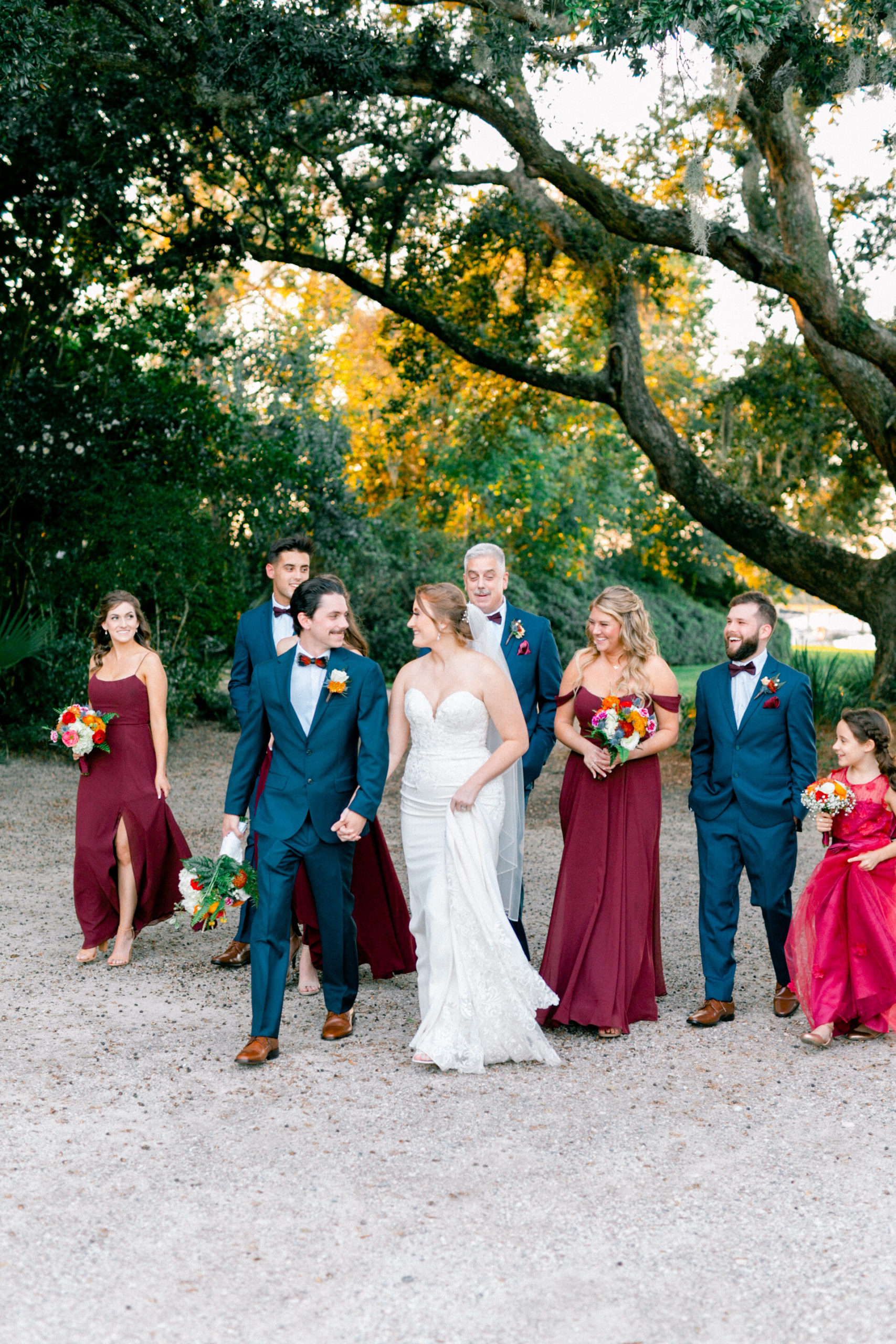 Colorful, joyous wedding party photographs in Charleston, South Carolina seaside wedding.