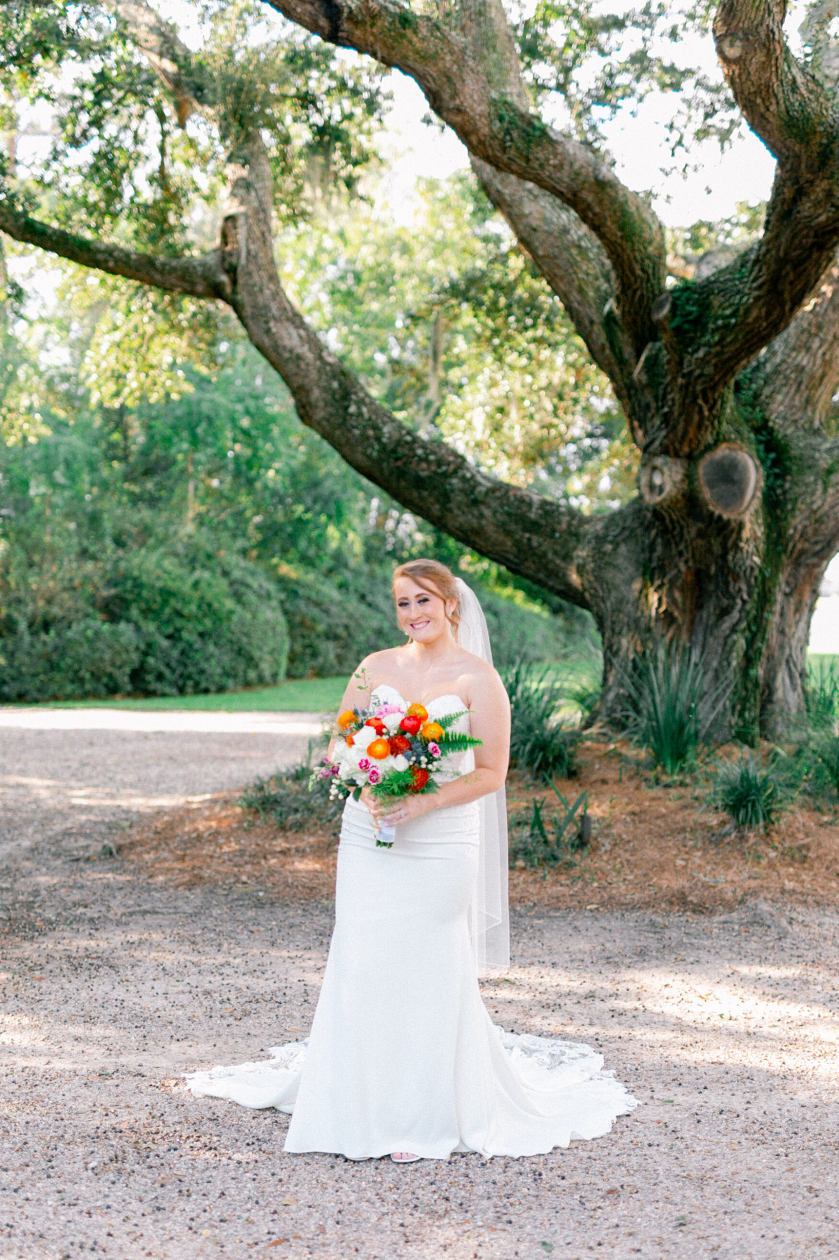 Bride before walking down the aisle under the Spanish moss in Charleston, South Carolina.
