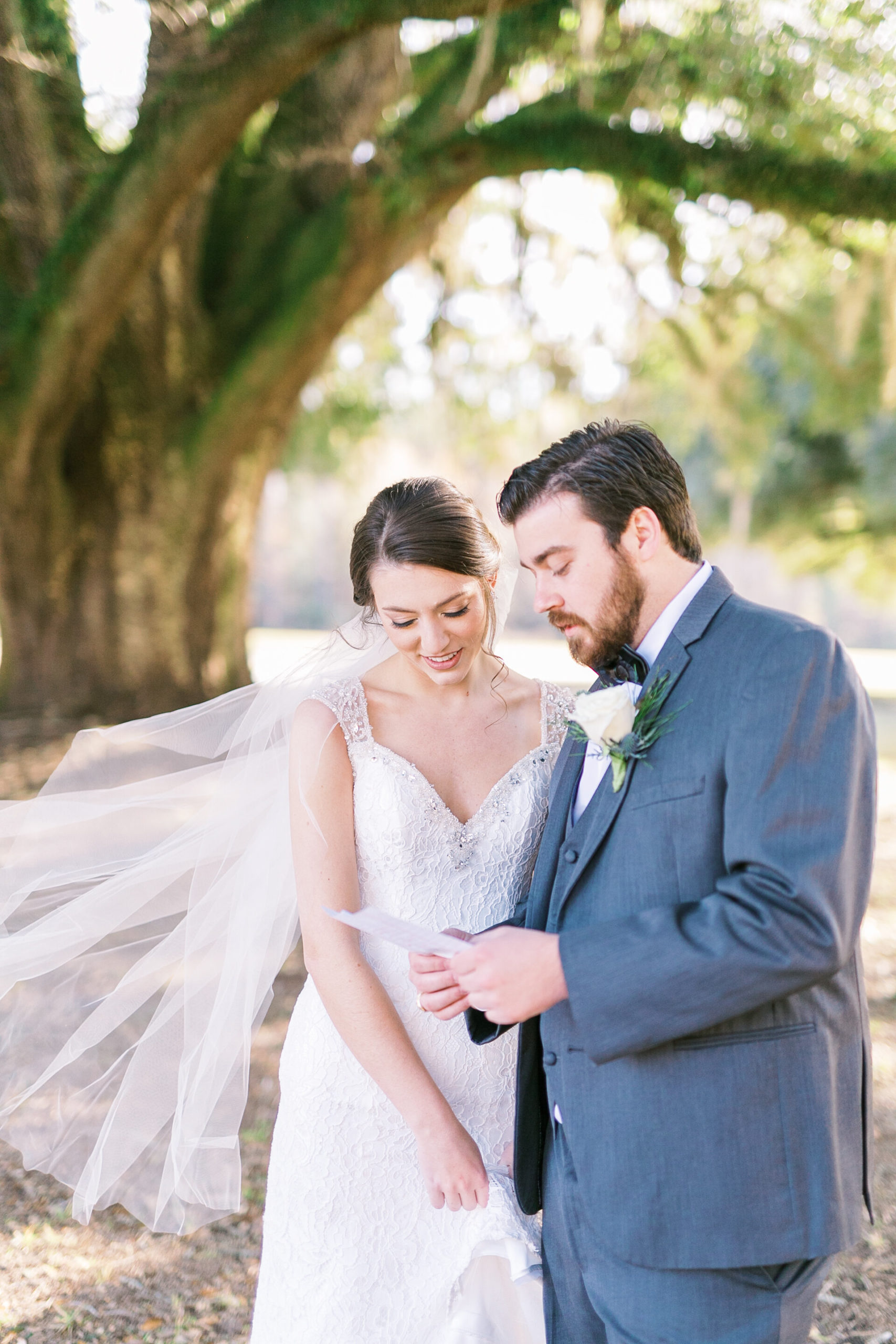 Bride and groom read letters to one another for South Carolina wedding.