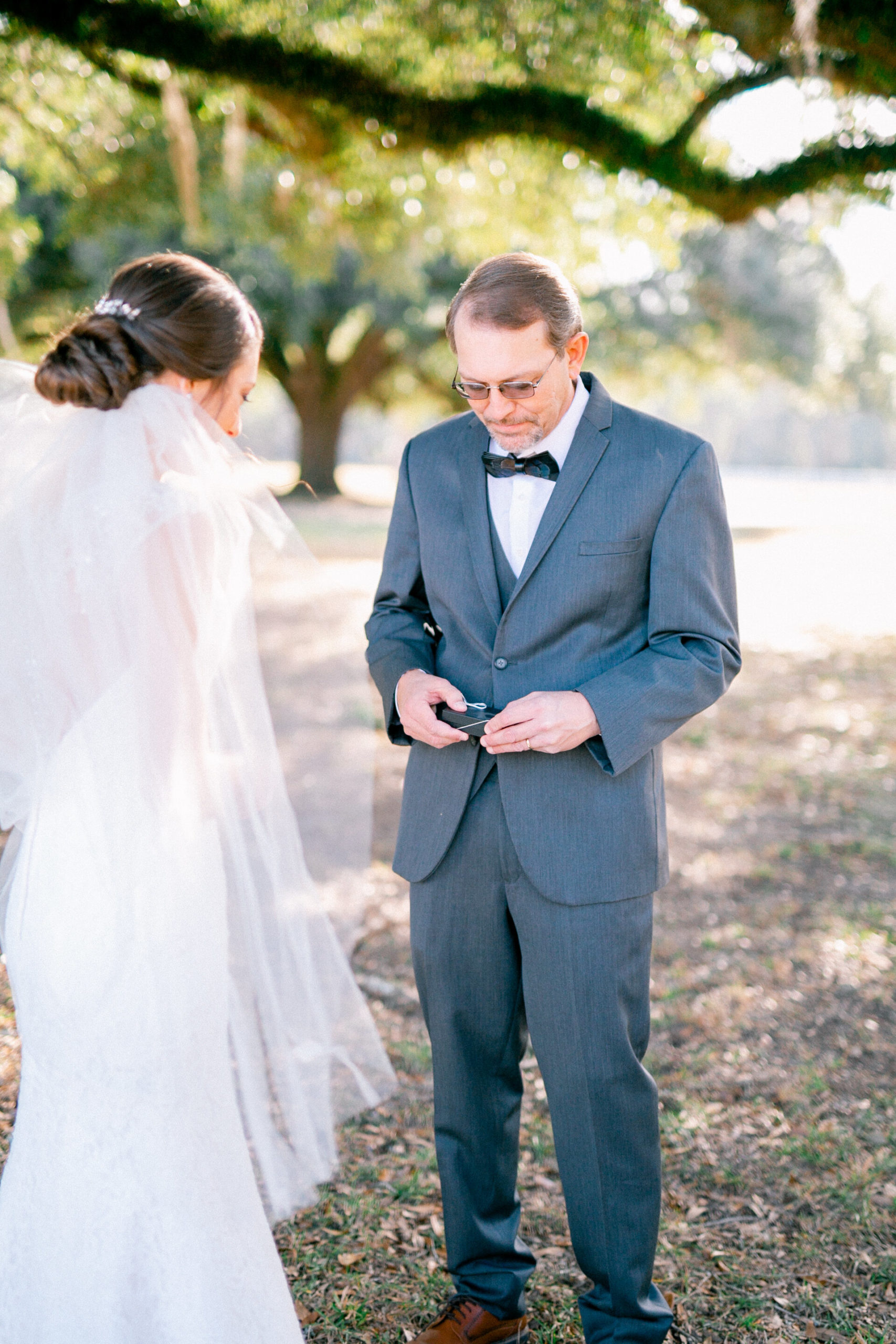 Bride shares a sweet moment with her father on her wedding day.