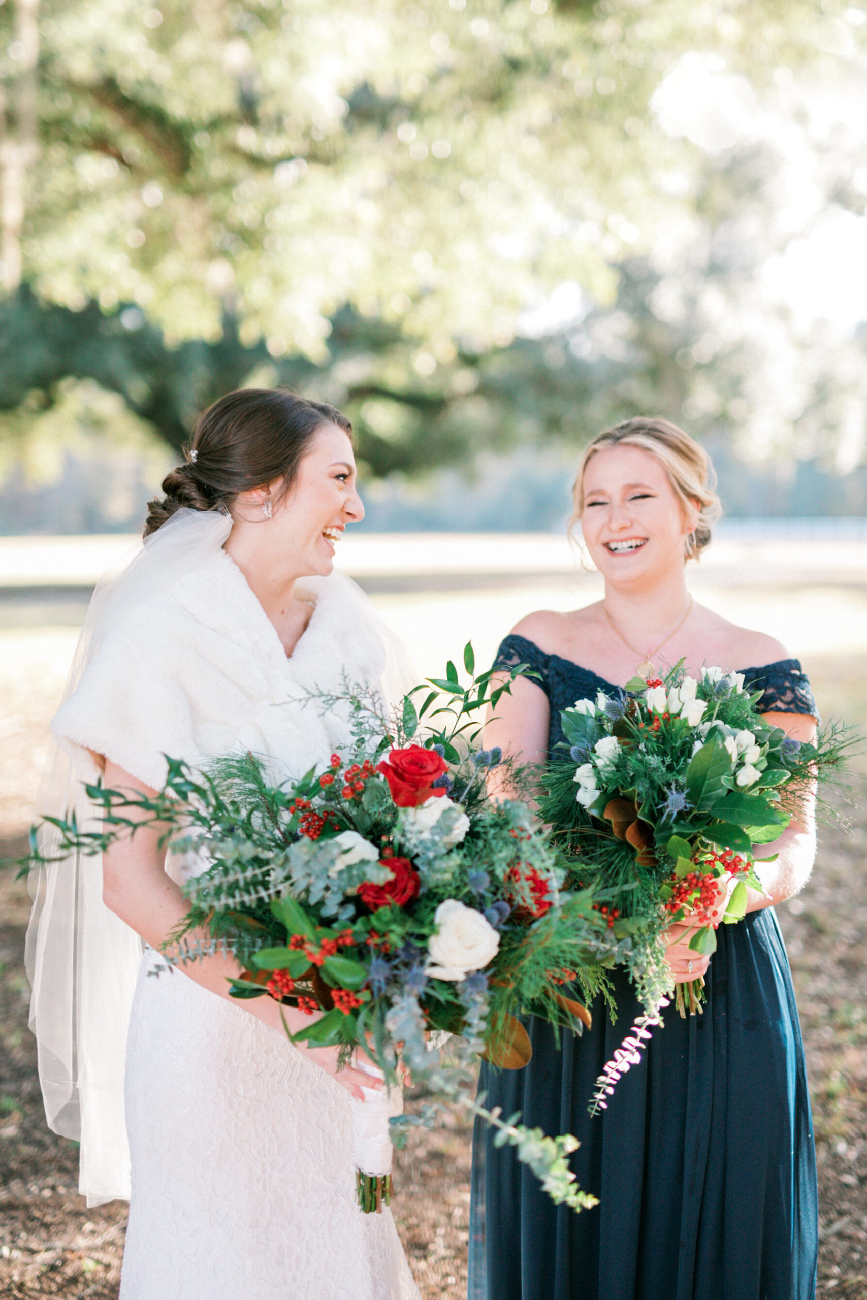 Maid of honor with the bride at luxury Charleston wedding.