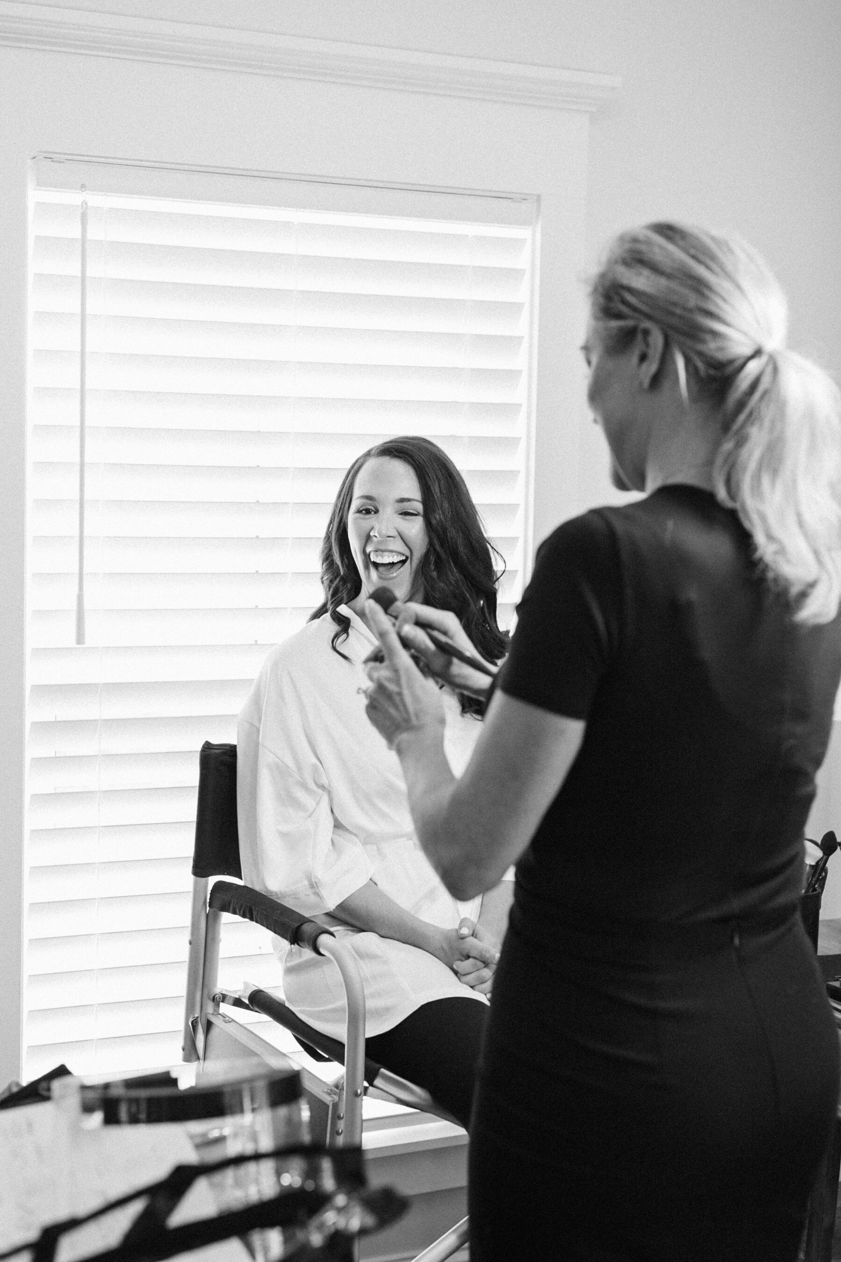 Charleston bride getting her hair and makeup done before her spring wedding