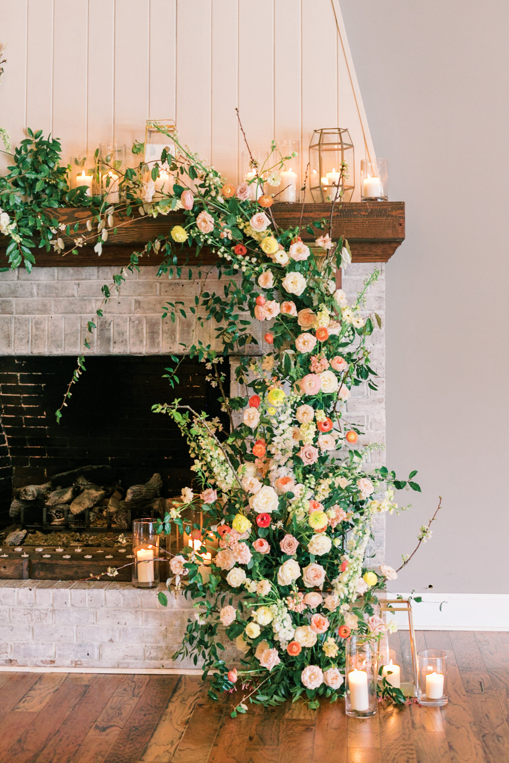 Unreal mantle floral display for high end Charleston wedding