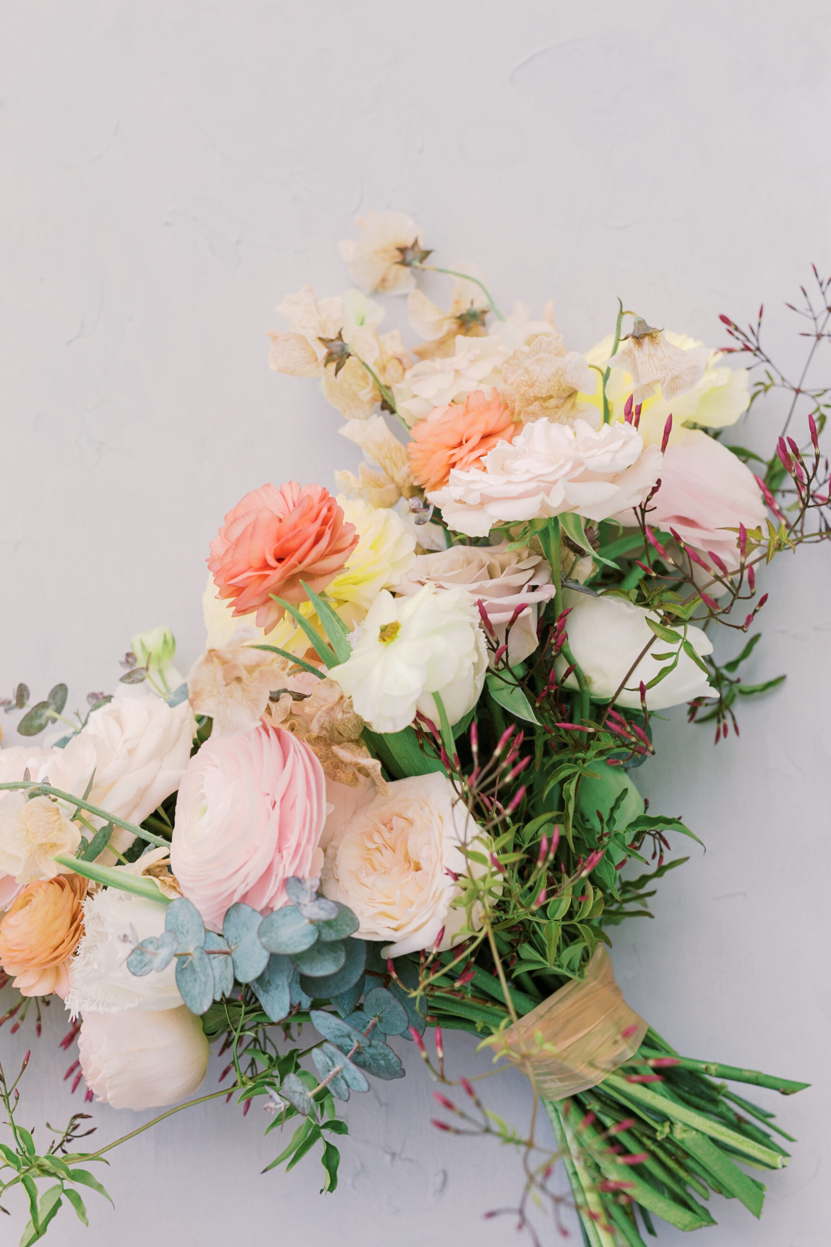 Vibrant floral arrangement for springtime Charleston wedding at Daniel Island