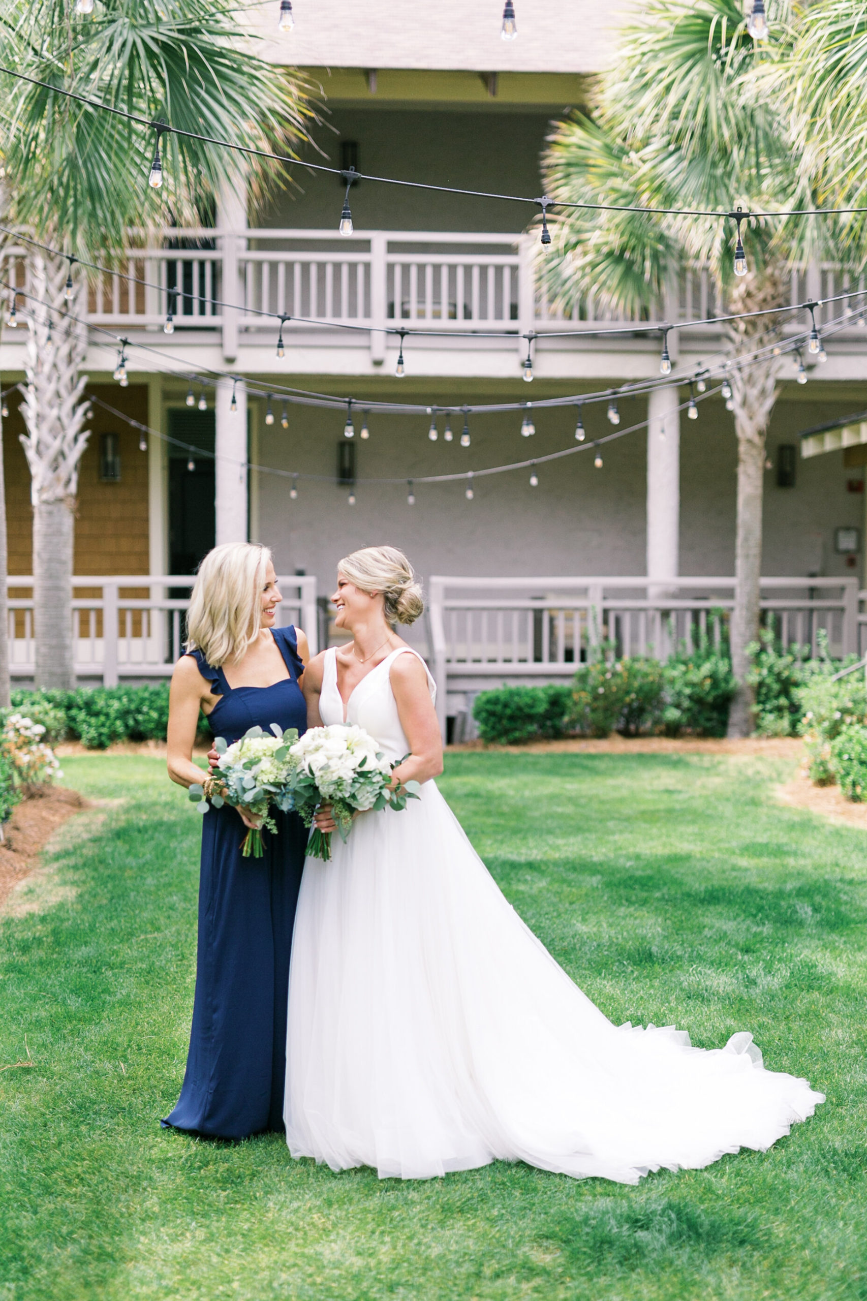 Bride with her maid of honor in Charleston, South Carolina wedding.