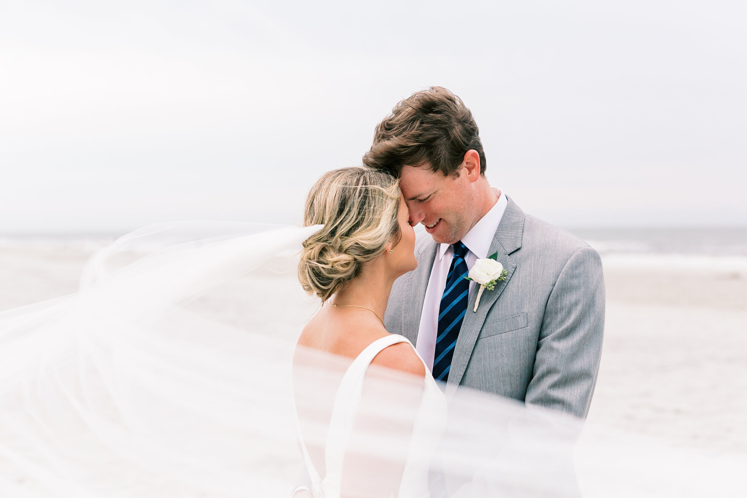 Breathtaking beach portrait of bride and groom at Hilton Head Island, South Carolina wedding.