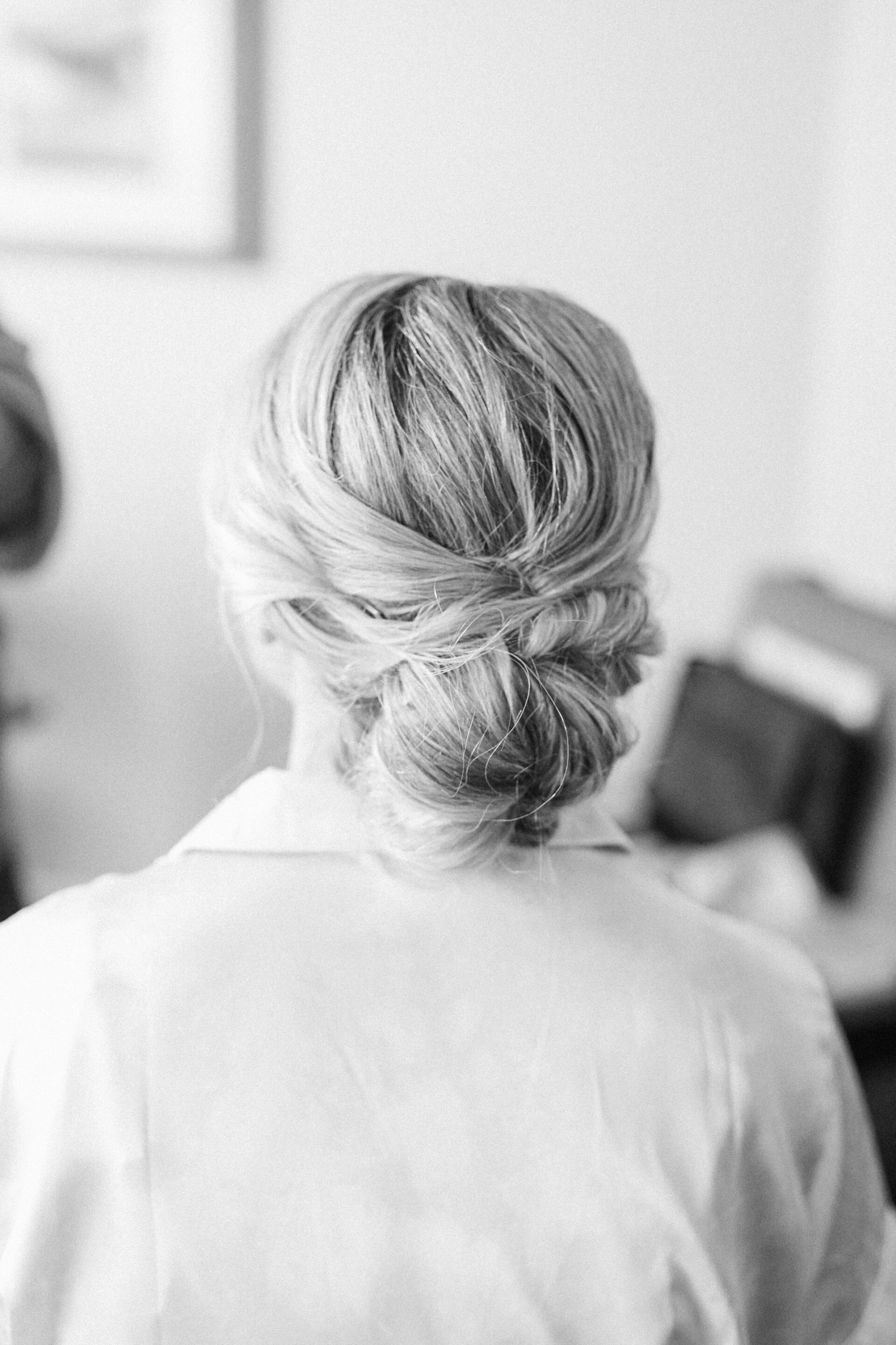 Bride getting her hair and makeup done for a springtime oceanfront wedding in Hilton Head.