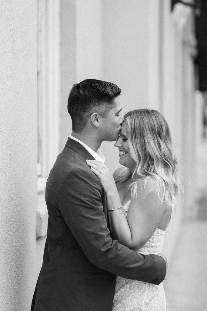 Loving forehead kiss for Charleston SC engagement photographs