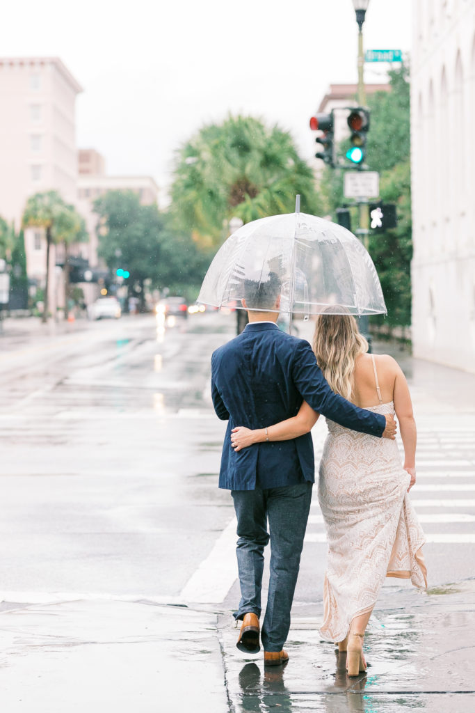 Sweet couple braves rainy day in Charleston engagement photos session