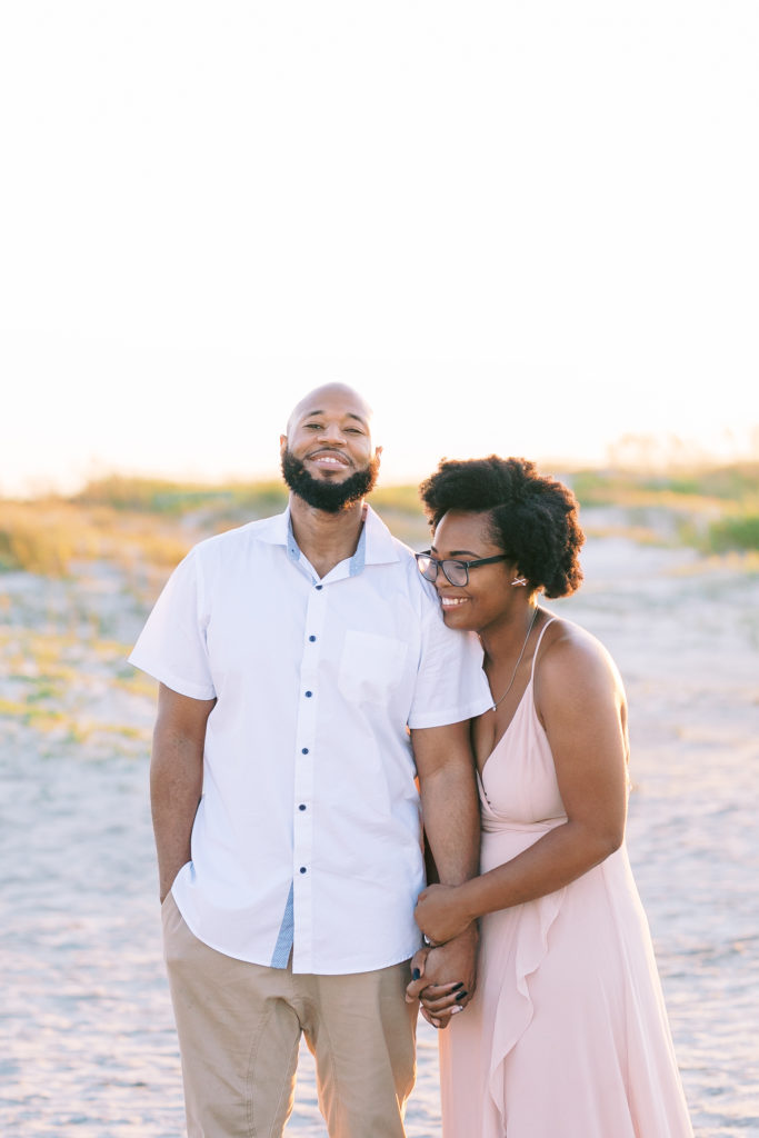 Sweet couple in Charleston takes beach engagement photos