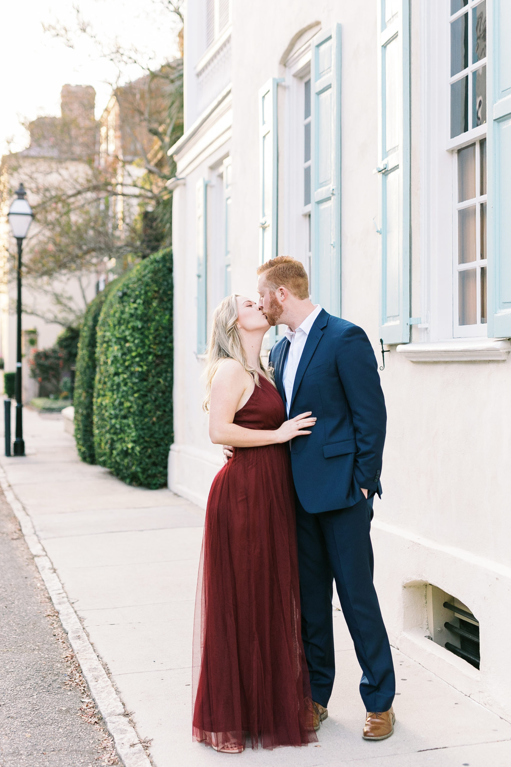 Romantic couple in epic shot in downtown Charleston engagement photos