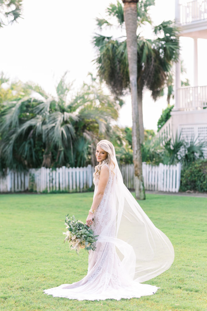 Stunning bridal veil photograph in Charleston wedding by the sea