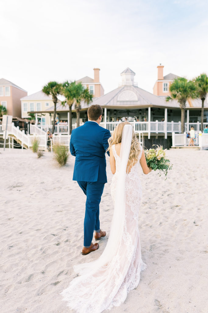 Bride and groom beachfront wedding Wild Dunes Resort