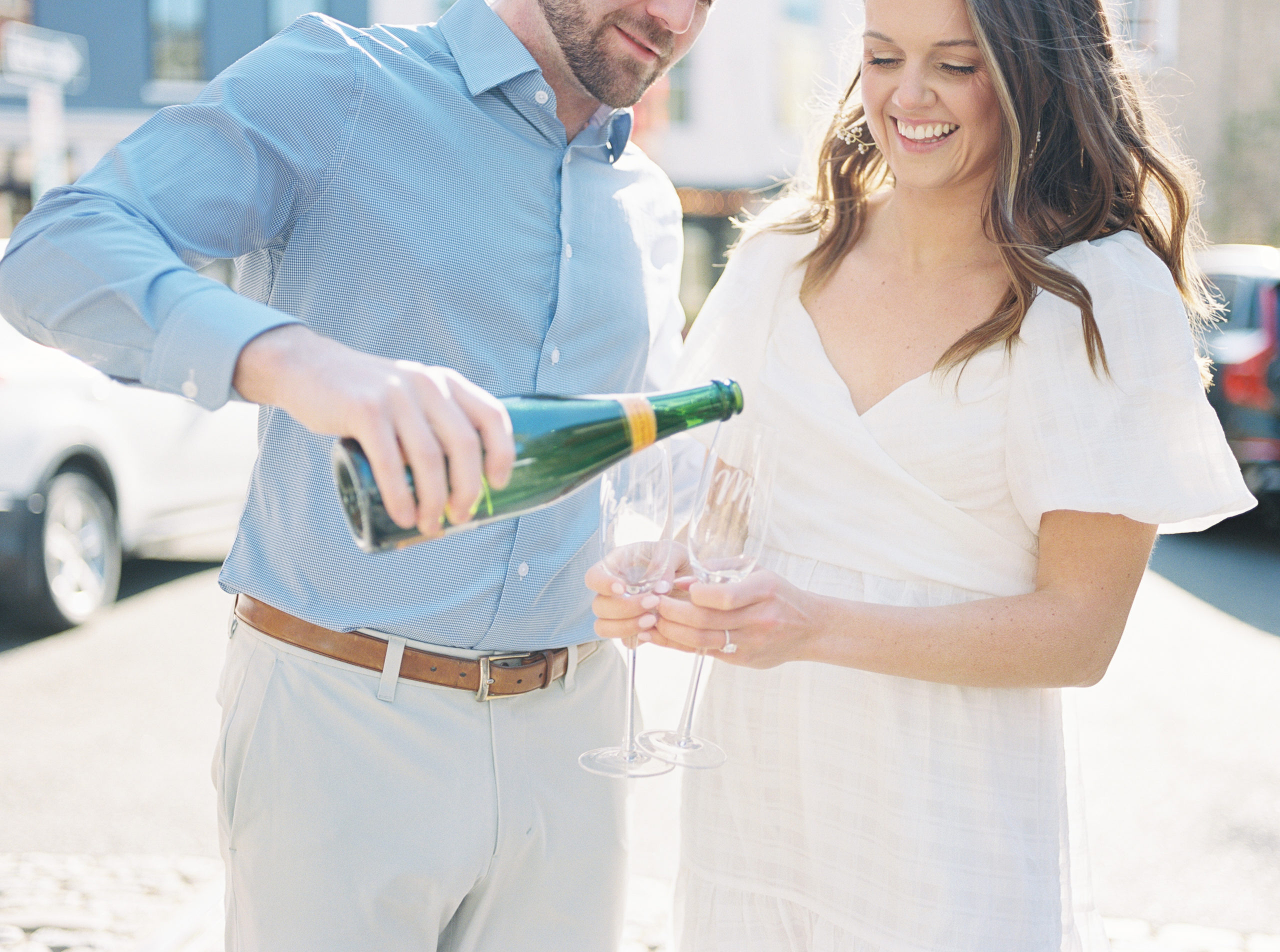 Champagne toast for Georgetown engagement photos on film