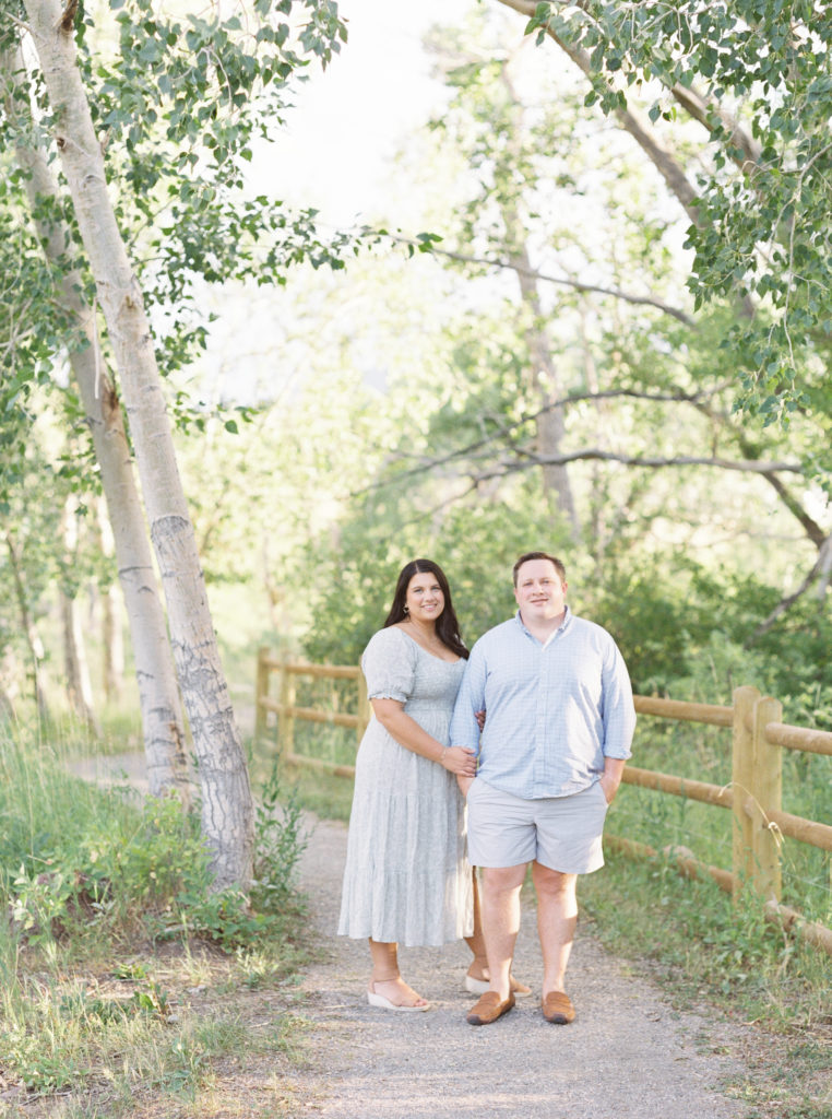 Engaged couple in Colorado amongst the aspen trees for their colorado engagement session
