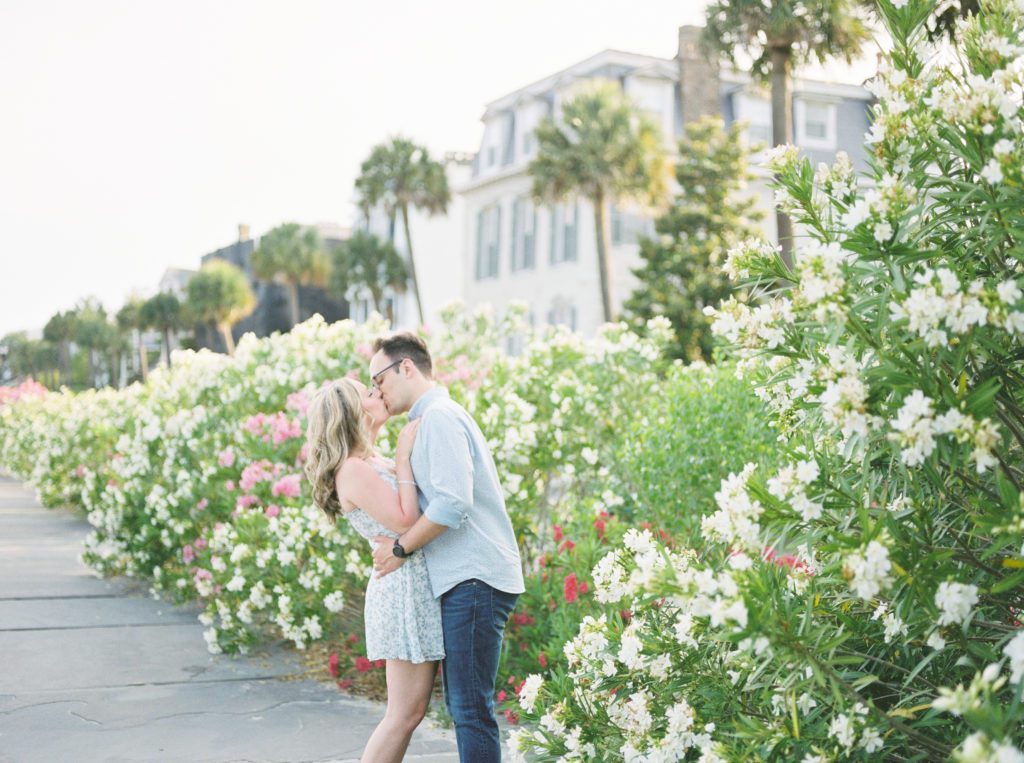 Destination wedding photographer documents Charleston engagement portraits in the springtime