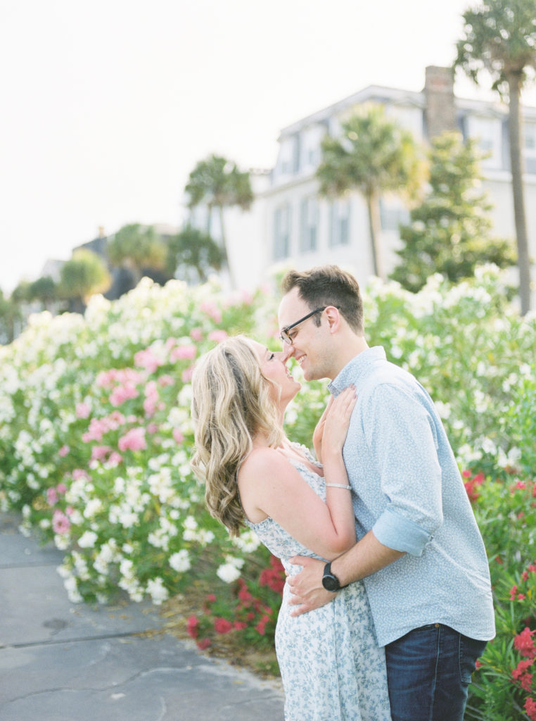 Engaged couple shares a hug during Charleston Battery engagement portraits