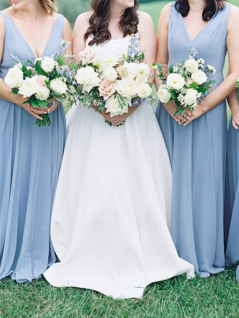 Blue and white floral bouquets for bridesmaids at Chattooga Belle Farms wedding day