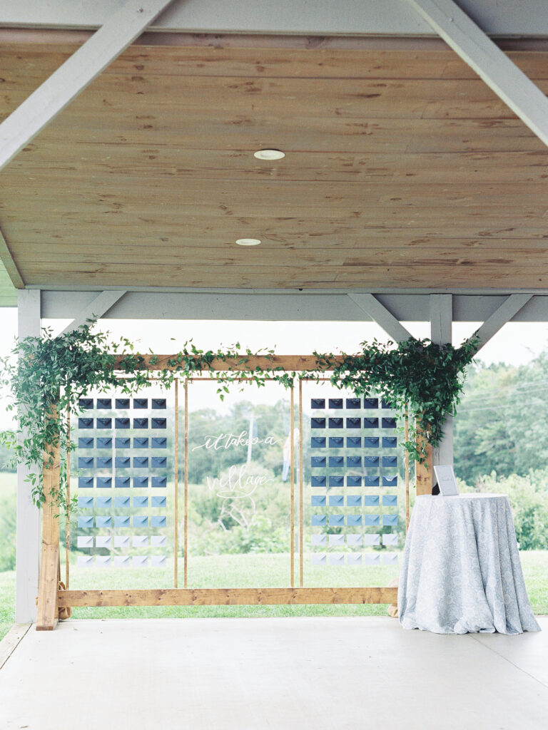 custom seating chart with multicolored blue envelopes