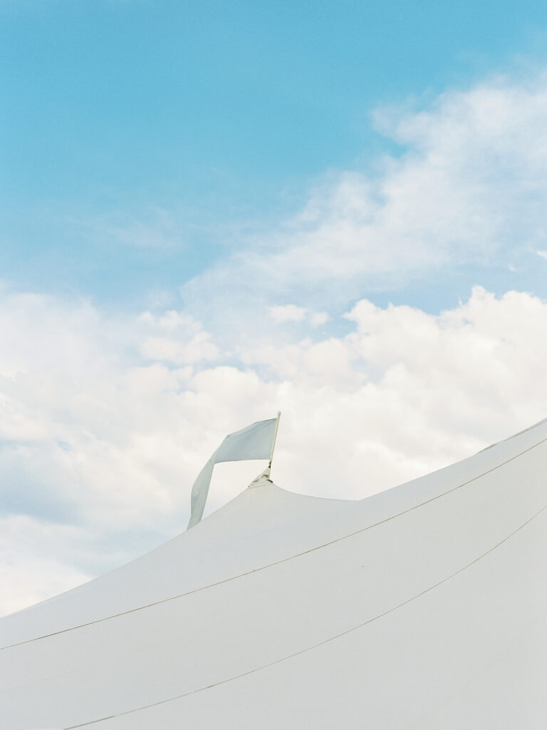 A detail image of the top of a sailcloth tent at a Boulder wedding venue.