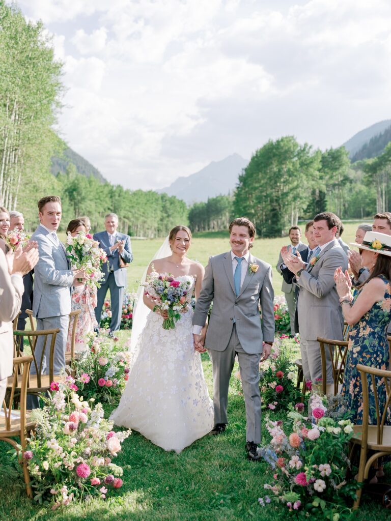T Lazy 7 Ranch Aspen wedding ceremony in mountain meadow