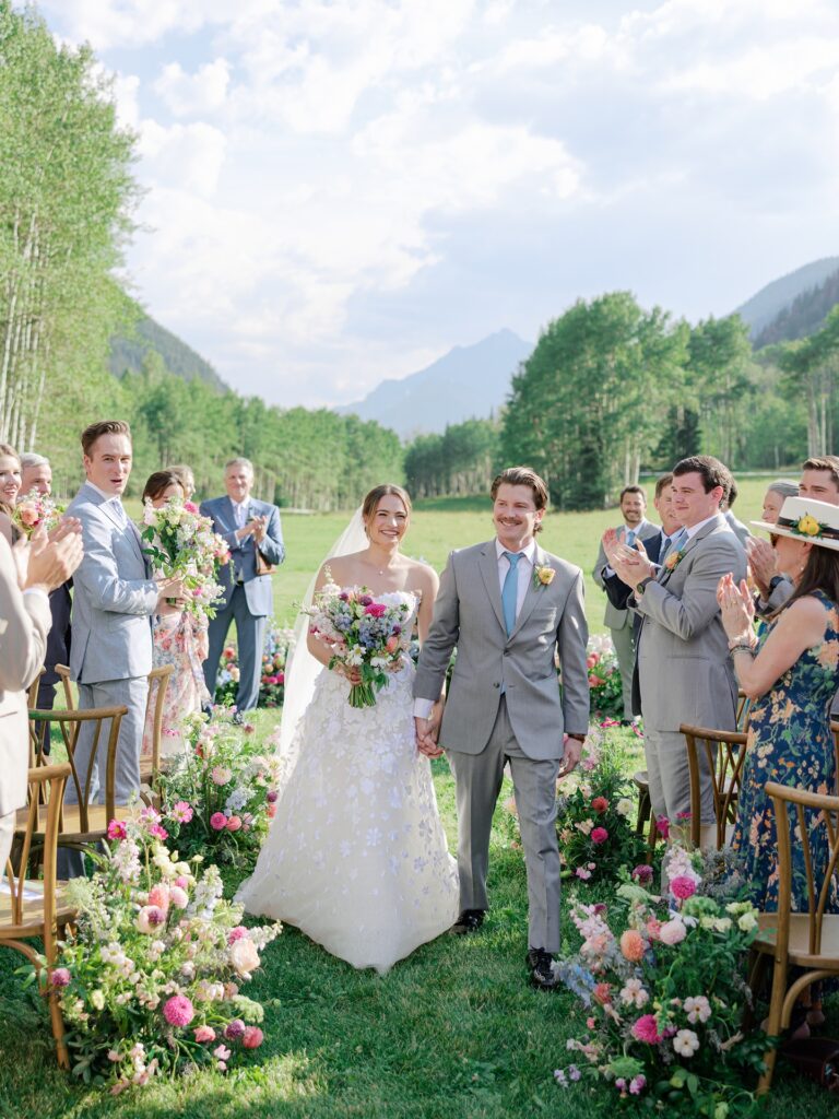 T Lazy 7 Ranch wedding ceremony meadow with Maroon Bells backdrop
