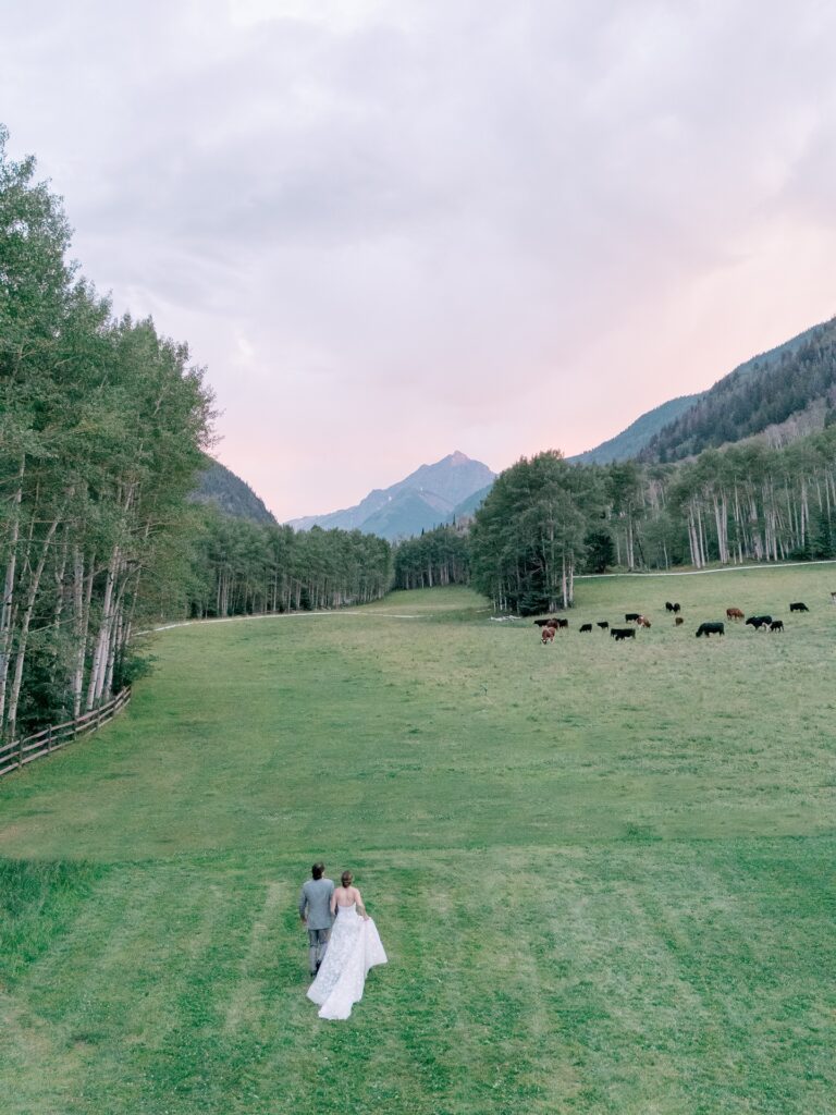 Bride and groom enjoys golden mountain light at T Lazy 7 Ranch