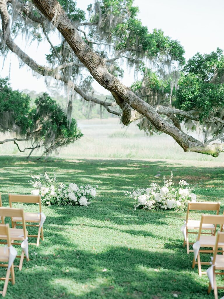 Floral arch ceremony design at a The Dunlin Kiawah wedding