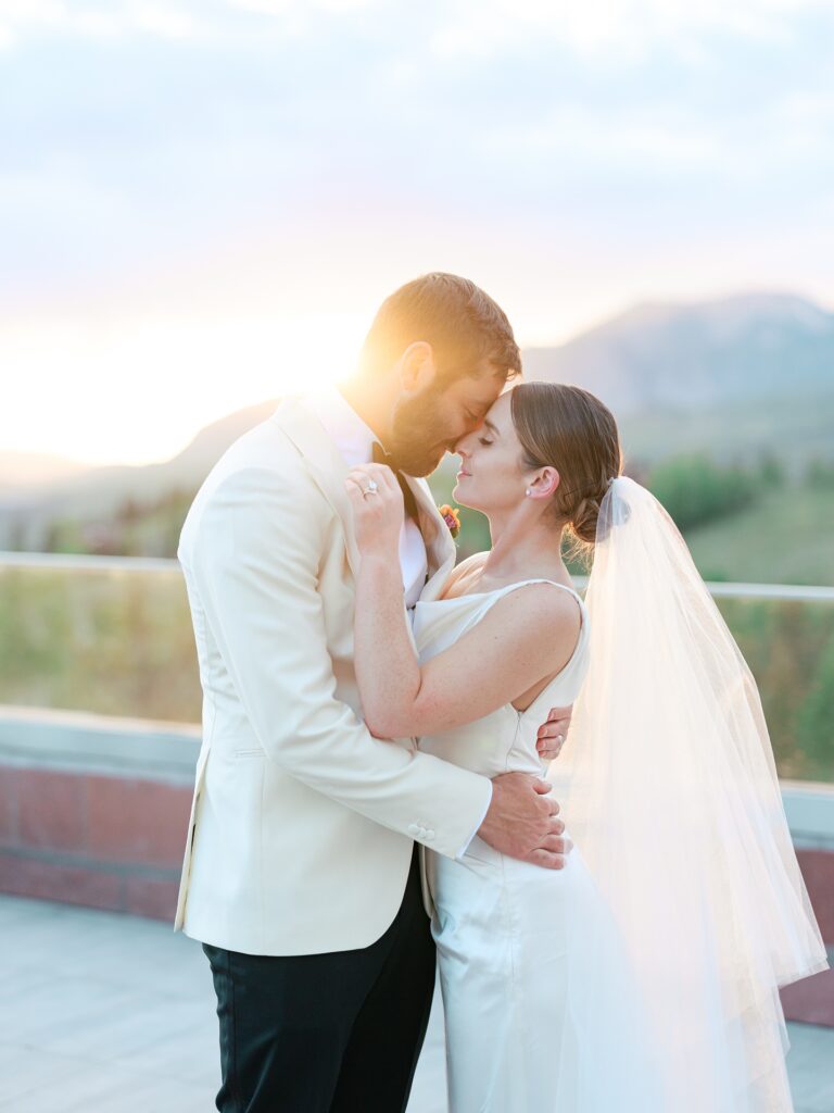 Resort wedding experience at The Peaks Telluride, golden hour sunset photos of bride and groom