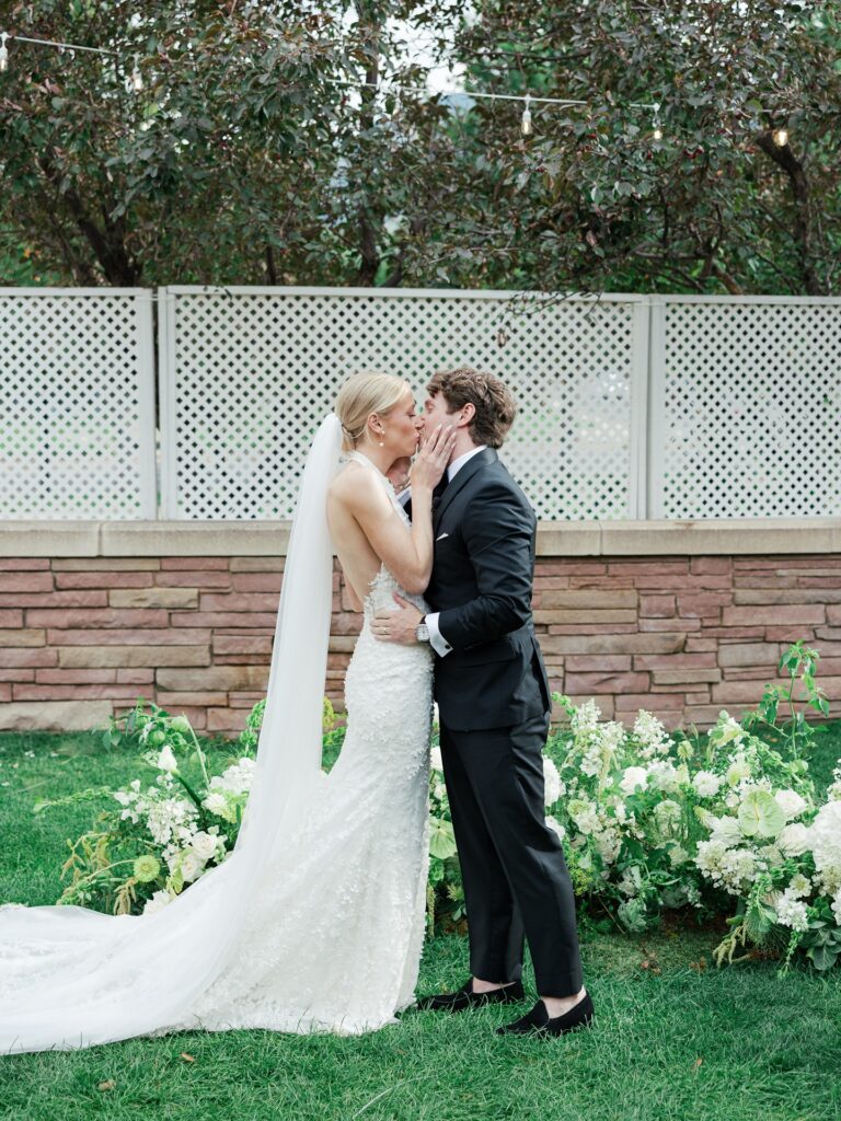 Garden party wedding ceremony on the St Julien Hotel lawn in Boulder Colorado during summer